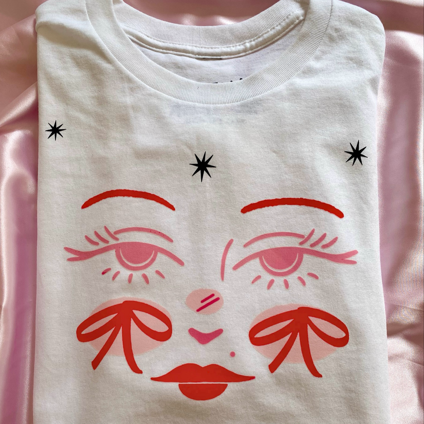 PLAYERA CARITA ROSA