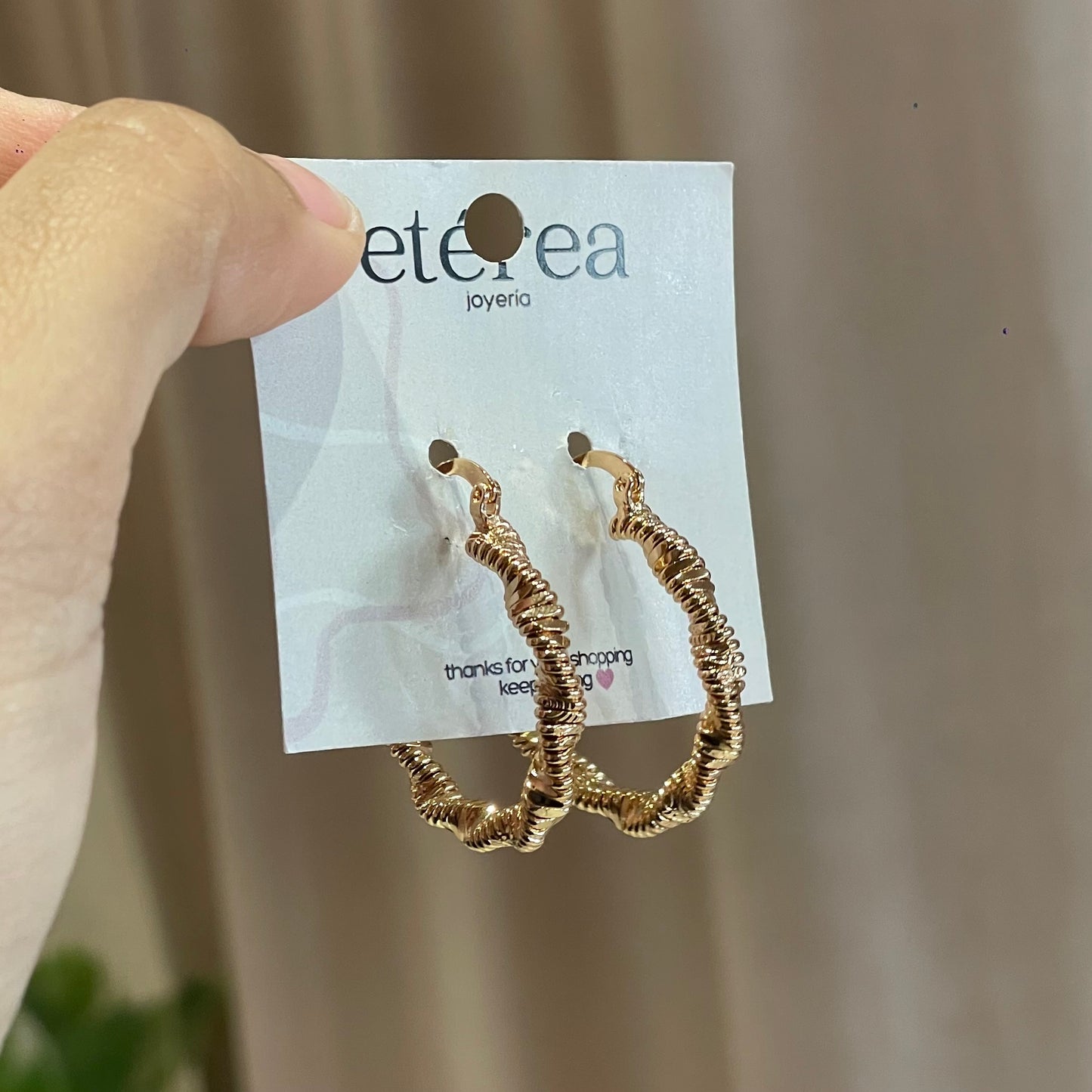 ARETES AROS TORCIDOS