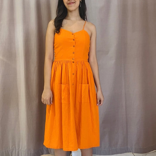 LINEN DRESS WITH ORANGE BUTTONS